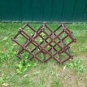 Vintage dark stained wooden accordion wine rack expandable bottle storage